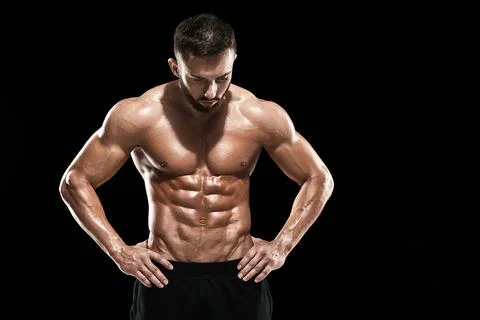 Muscular bodybuilder guy doing posing Stock Photos