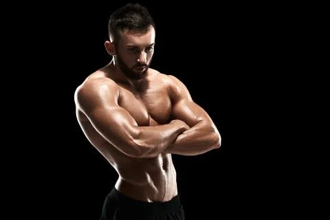 Muscular bodybuilder guy doing posing Stock Photos