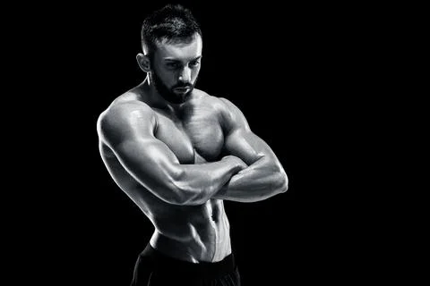 Muscular bodybuilder guy doing posing Stock Photos