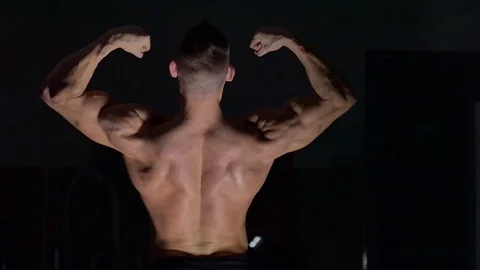 Muscular bodybuilder handsome men doing exercises in gym naked torso Stock Footage 72001707