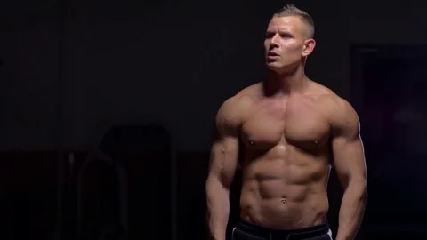 Muscular bodybuilder handsome men doing exercises in gym naked torso Stock Footage 72001850