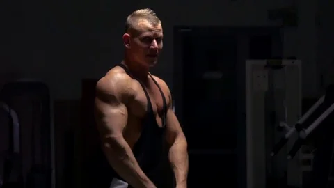 Muscular bodybuilder handsome men doing exercises in gym naked torso Stock Footage 72606568