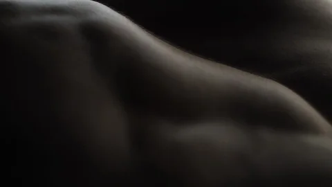 Muscular Bodybuilder Posing on White Background Vidéo 128346725