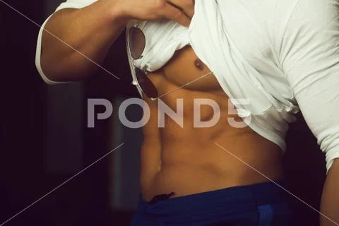 Muscular male torso with abs, ab, six pack, six packs, Stock Photos