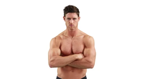 Muscular man keeping arms crossed Stock Photo by ©gstockstudio 75617291