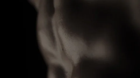 Muscular Man Bodybuilder. Man Posing On A Black Background, Shows His Muscles Video stock 128346407