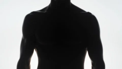 Muscular Man Bodybuilder. Man Posing On A White Background, Shows His Muscles Video stock 128346616
