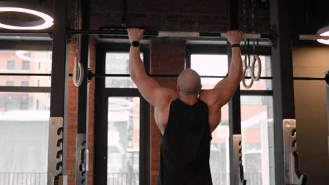 Muscular man doing pull up exercise. Stock Footage 263799332