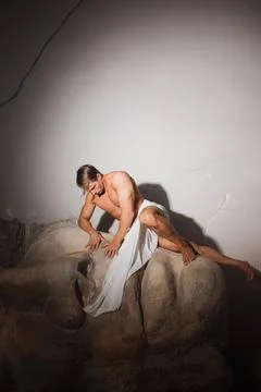 A muscular man in a dramatic pose Stock Photos