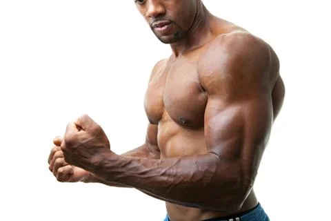 Muscular Man Flexing Stock Photos
