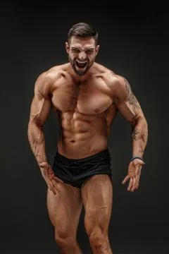 Muscular man screaming Stock Photos