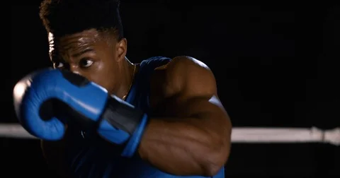 Muscular man shadowboxing, closeup Stock Footage 83323862