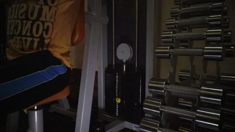 Muscular middle age man doing exercise in gym Stock Footage 89618264