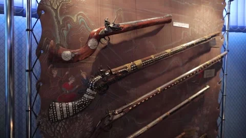 Museum, ancient types of firearms exhibited in the showcase Video stock 235421785