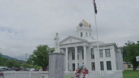 Museum building and flag pole in Bryson City, North Carolina in slow motion Stock Footage 204055602