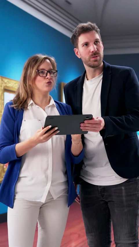 Museum Curator Carefully Examining Art Stock Stock Footage 332908249