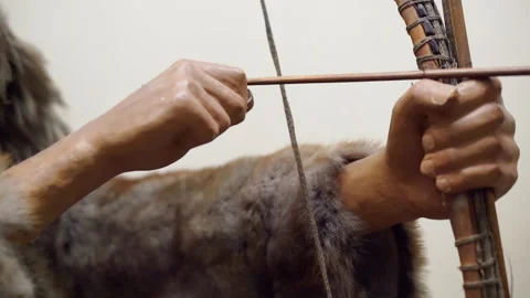 A museum exhibit of a hunter with a bow. Stock Footage 267728133