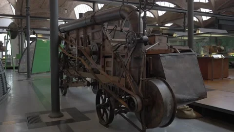 Museum harvester grain curious machine old agriculture industry history retr Stock Footage 344273015