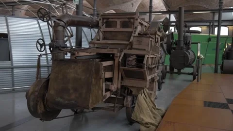 Museum harvester grain machine old wood agriculture curious industry retro Stock Footage 344111194