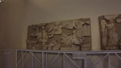 Museum Interior with Fragmented Classical Stone Relief Stock Footage 312746395