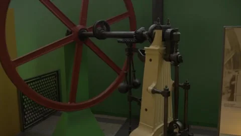 Museum wheel machine metal old iron pump industry history retro vintage Stock Footage 344111342