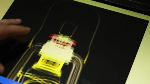 Museum worker works with the x ray image of the kerosene lamp Stock Footage 100599114