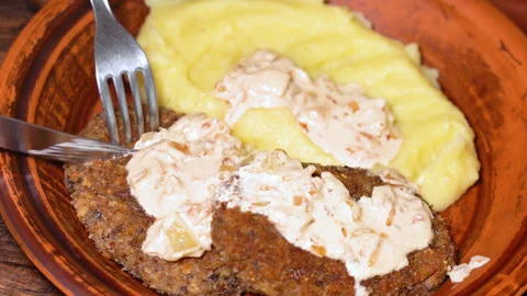 Mushroom cutlets with mashed potatoes on a plate Stock Footage 252747477
