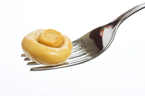 Mushroom on a fork 스톡 사진