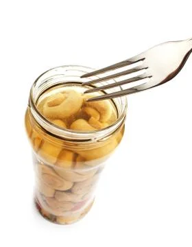 Mushroom on a fork Stock Photos