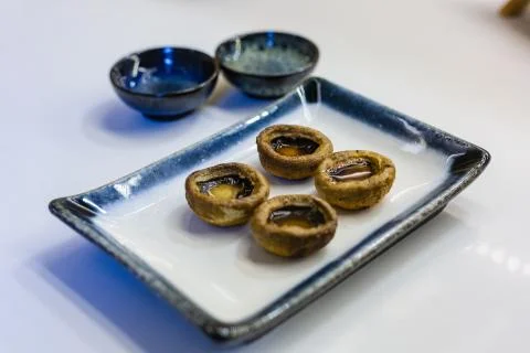 Mushroom on the plate, Chinese snack Stock Photos
