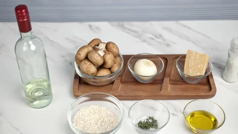 Mushroom risotto ingredients on the table. Stock Footage 134678511