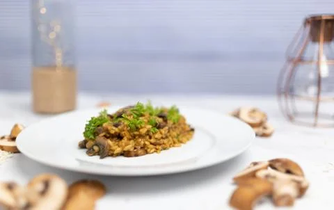Mushroom risotto with Parmesan cheese. Stock Photos