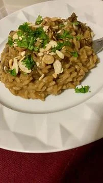Mushroom risotto with parsley Stock Photos