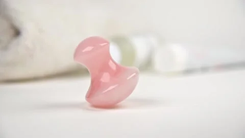 Mushroom shaped quartz stone for face and body massage. Video stock 148435464