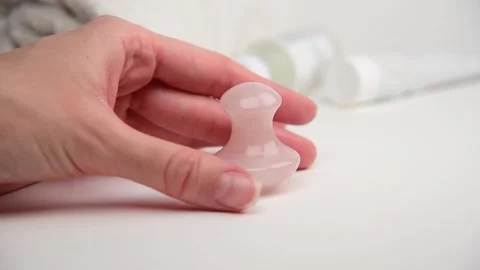 Mushroom shaped quartz stone for face and body massage. Stock Footage 148435548
