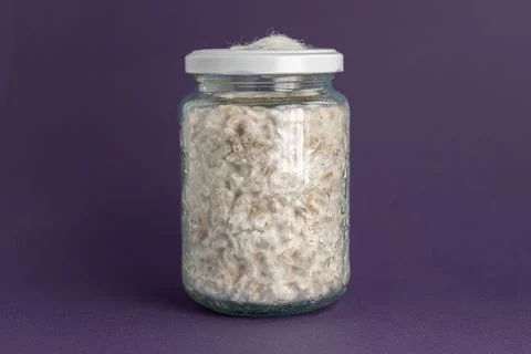 Mushroom Spawn. Jars of Grain Spawn. Close-up mycelium growth on Grain Spawn. Stock Photos
