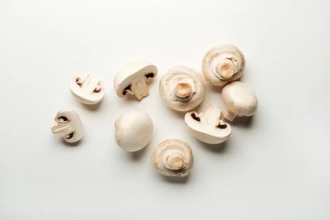 Mushrooms champignons on white. Stock Photos