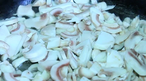 Mushrooms fried in a pan Stock Footage 61453571
