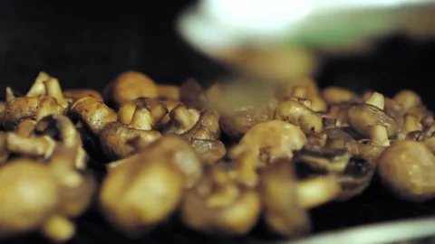 Mushrooms on the grill Stock Footage 79928916