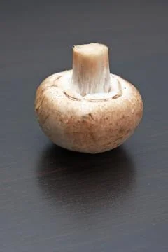 Mushrooms on kitchen table Stock Photos