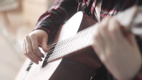 Music and  learning concept. Playing guitar Stock Footage 172694906