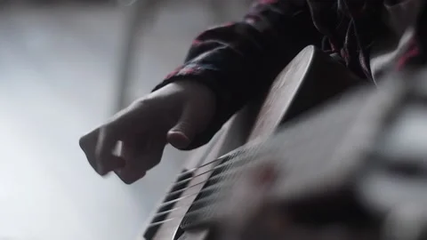 Music and  learning concept. Playing guitar Stock Footage 172698528