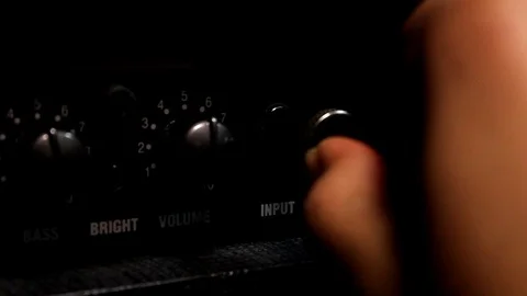 Music band concept background.Close up Hand man connect connect jack. Video stock 80359525
