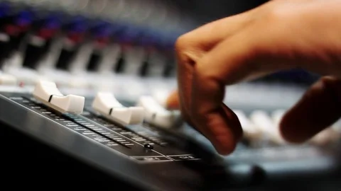 Music band concept background.Close up Hand man control the level of sound. Video stock 80359577