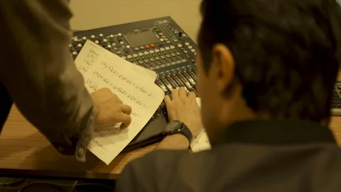 Music Composer &amp; Sound Engineer Working Together In Recording Studio Stock Footage 109447665
