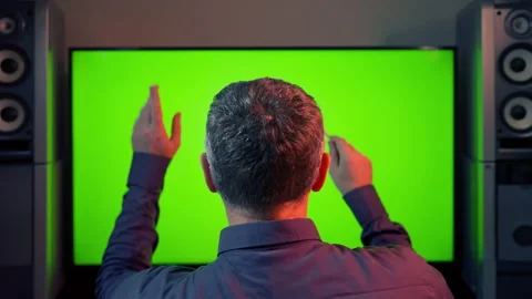 Music conductor using his baton facing away from the camera Stock Footage 167167478