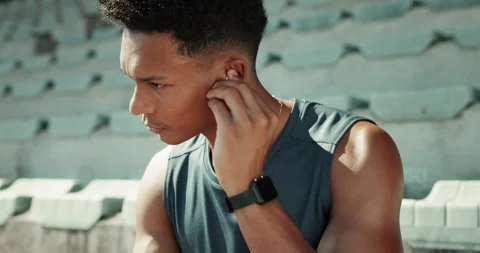 Music, dance and runner with man in stadium for streaming, workout playlist and Video stock 301363992