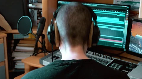 Music maker creating in bedroom studio Stock Footage 129672889