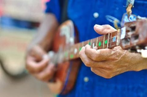 Music man is playing string indian lute Stock Photos