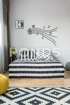 Music note stave in scandi bedroom Stock Photos
